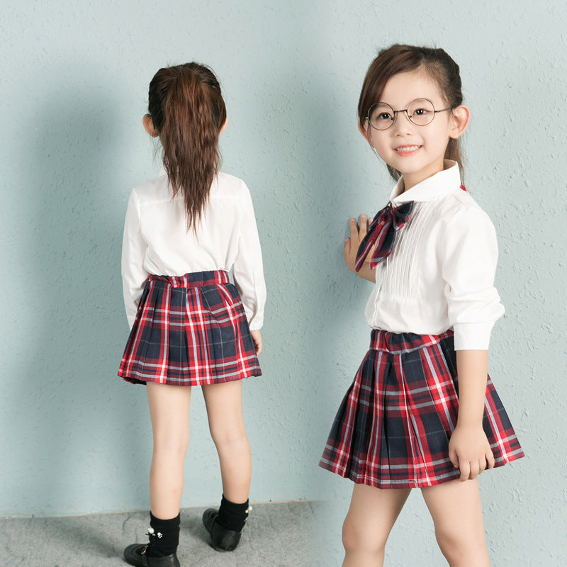Solid Color Shirt Plus Plaid Skirt